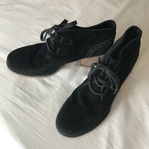 Black Suede heeled booties by Clarks